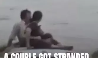 Couple stranded on car roof in Gujarat floods